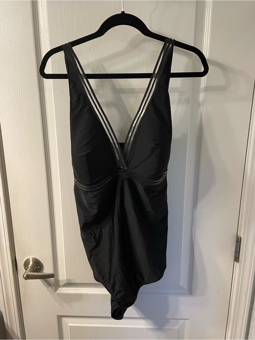 Classy Black One Piece Swimsuit with detailed edging.
